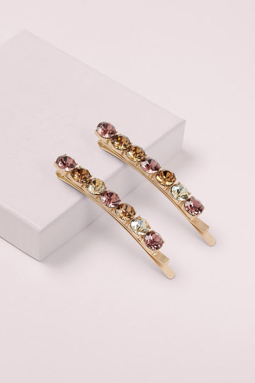 Glow On & Sparkle Gemstone Bobby Pins on a pink box