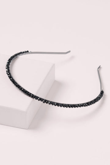 The Hair Edit Midnight Star Crystal Chaplet Slim Beaded Headband on a pink box