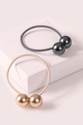 The Hair Edit orb duo dual-sphere metal hair tie accessory in gunmetal & soft gold