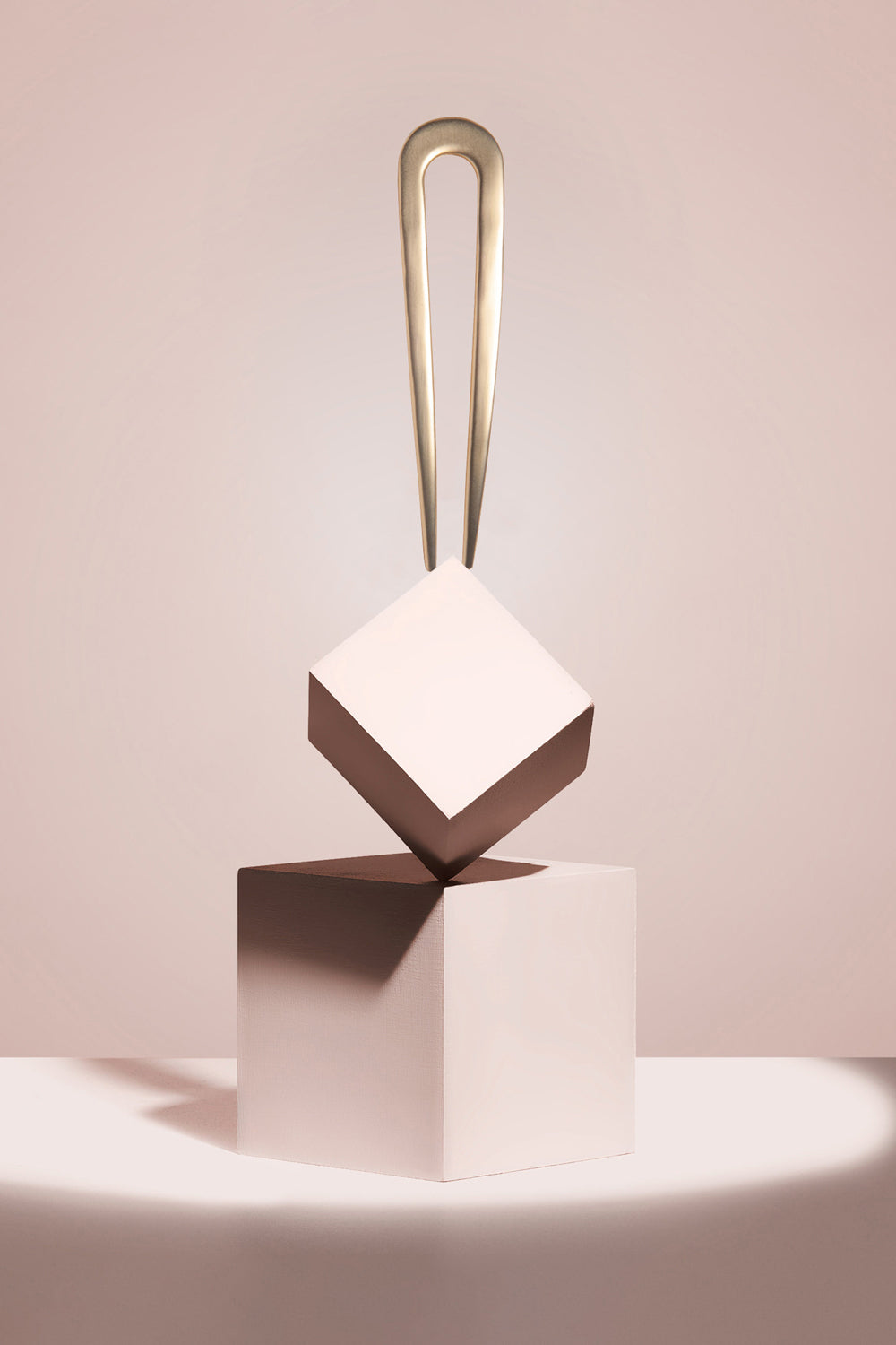 the hair edit gold sleek chignon french hair pin lifestyle image