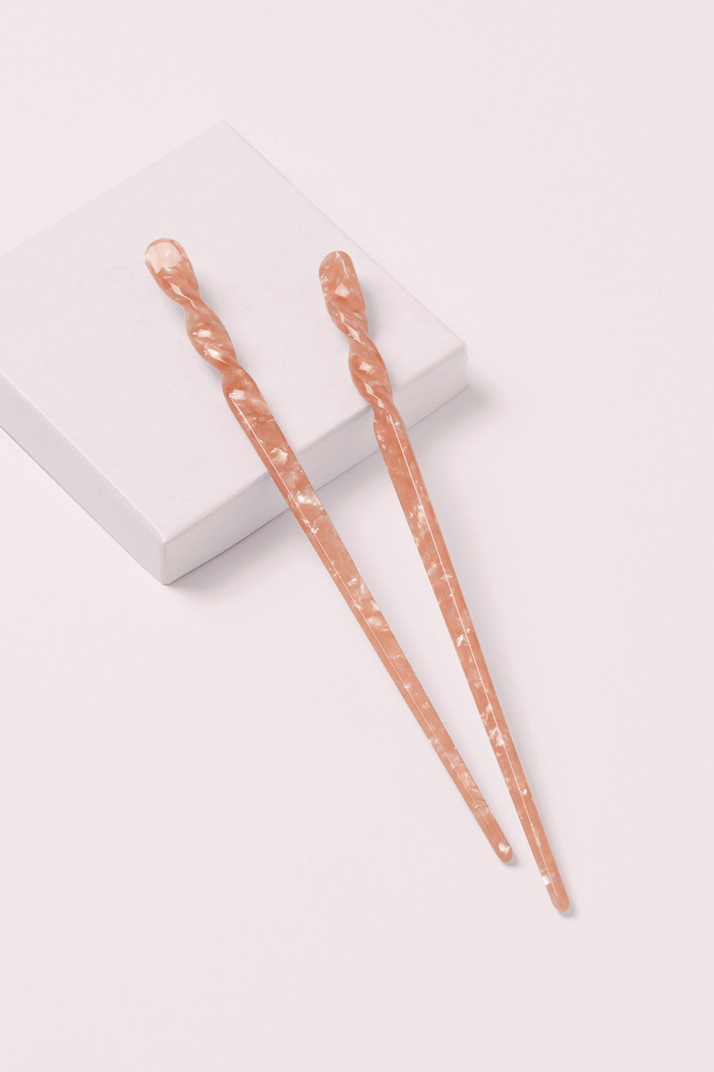 the hair edit marble pin up twist hair sticks on pink box