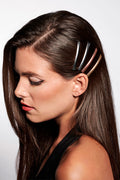 The Hair Edit Multicolored Gilded Metallic Bobby Pin Set in Pack of 4 on Long Haired Brunette Model Close-up